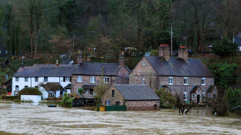 Flooding in Ironbridge, Shropshire, as residents in riverside properties in the area have been told to leave their homes and businesses immediately after temporary flood barriers were overwhelmed by water.