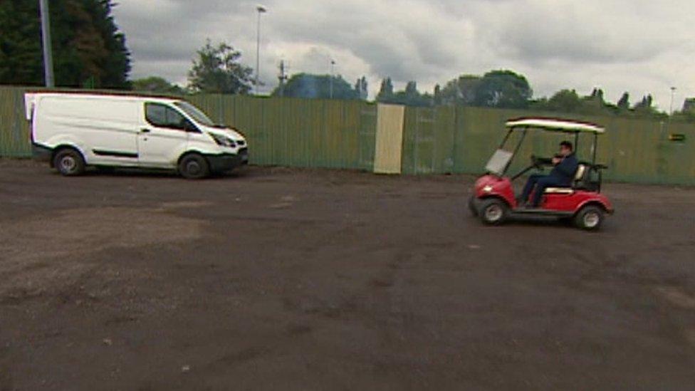 Jayson Lyon makes his escape in a golf buggy from the BBC team