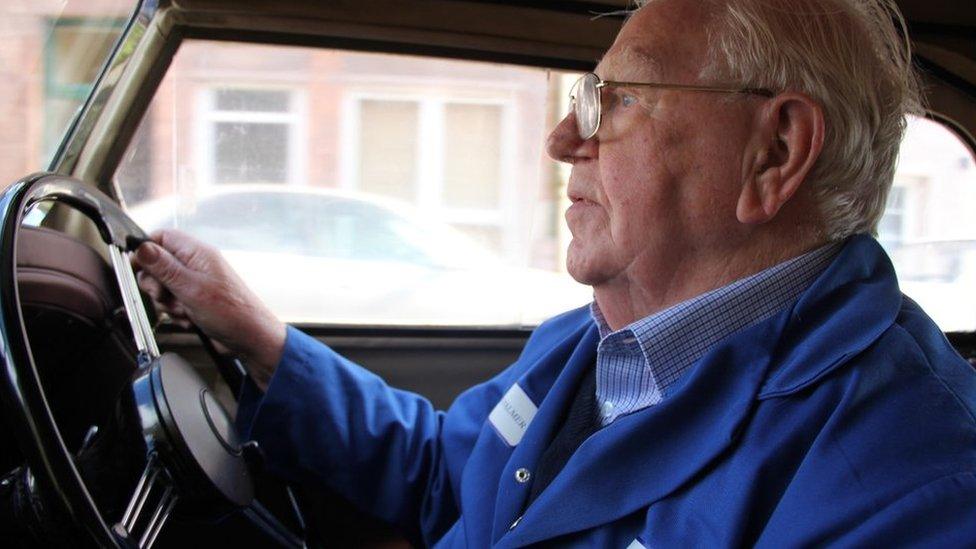 Charles Palmer at the wheel of his Rover 'Tourer'