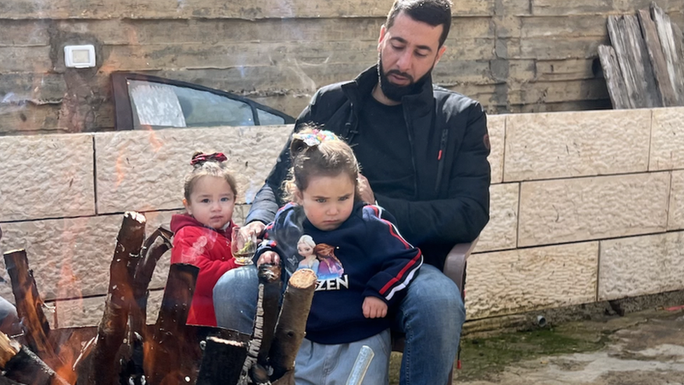 Kamal Karaja with his daughters