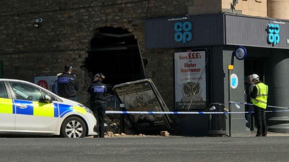 Hole in the wall of supermarket