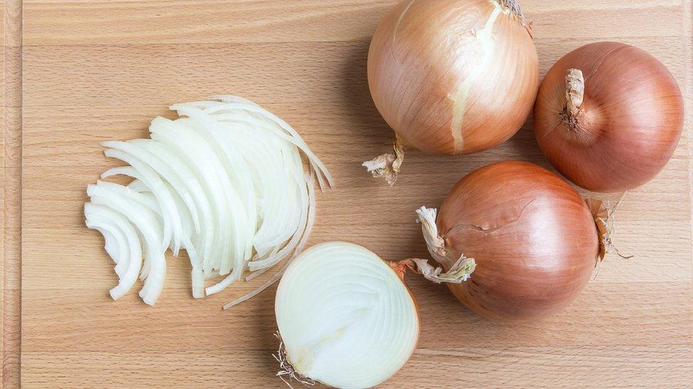 Onions on a chopping board