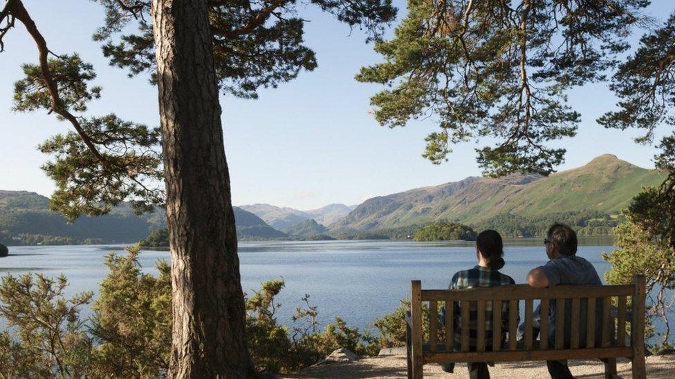 Couple at Friar's Crag overlooking Derwentwater