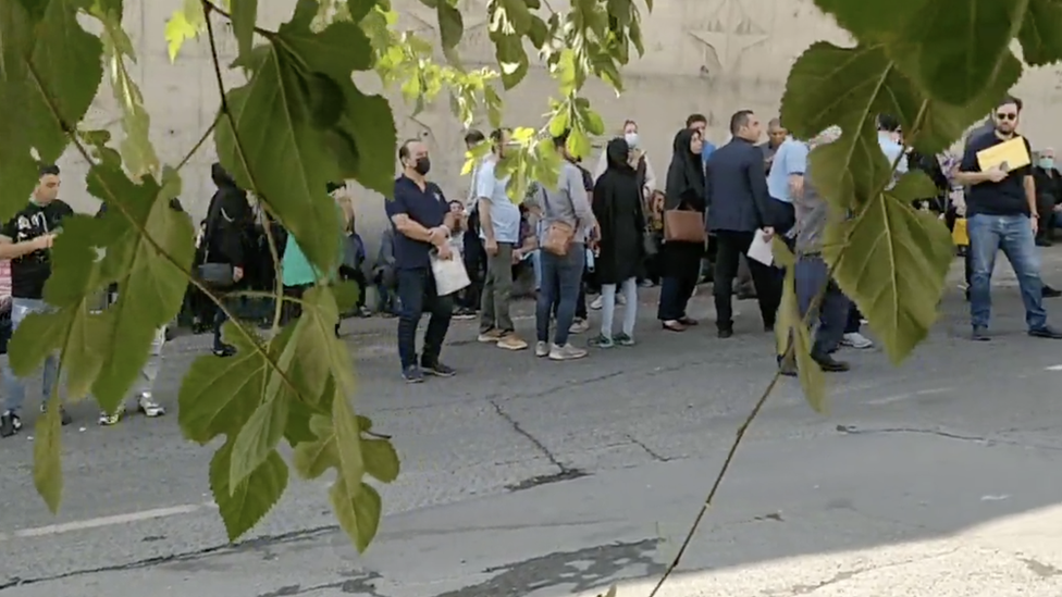 Queues outside a detention centre