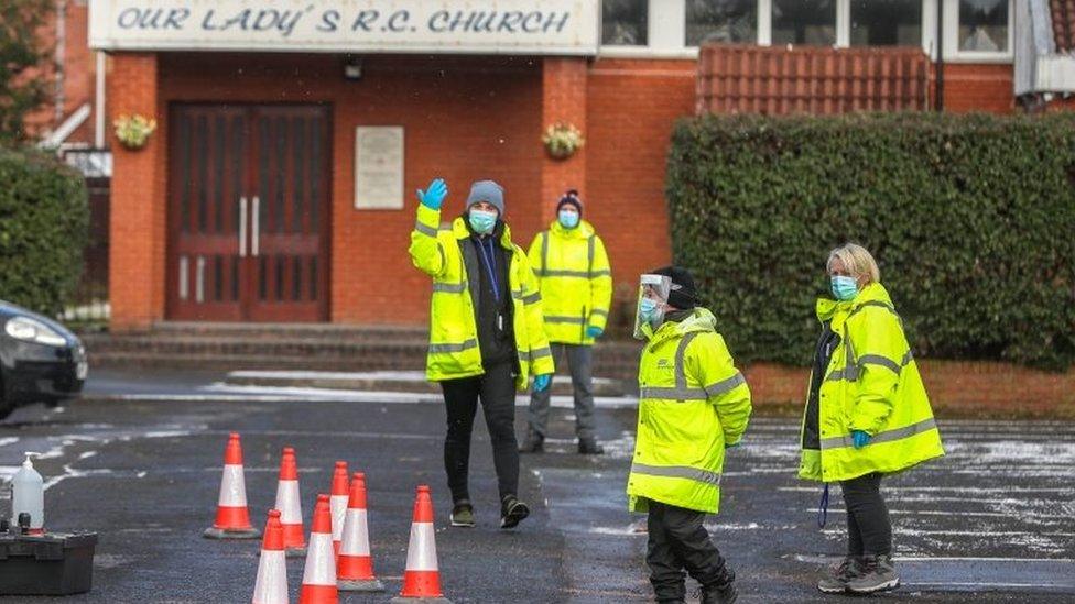 NHS track and trace staff start the new surge testing at Our Lady's Roman Catholic Church in Manchester