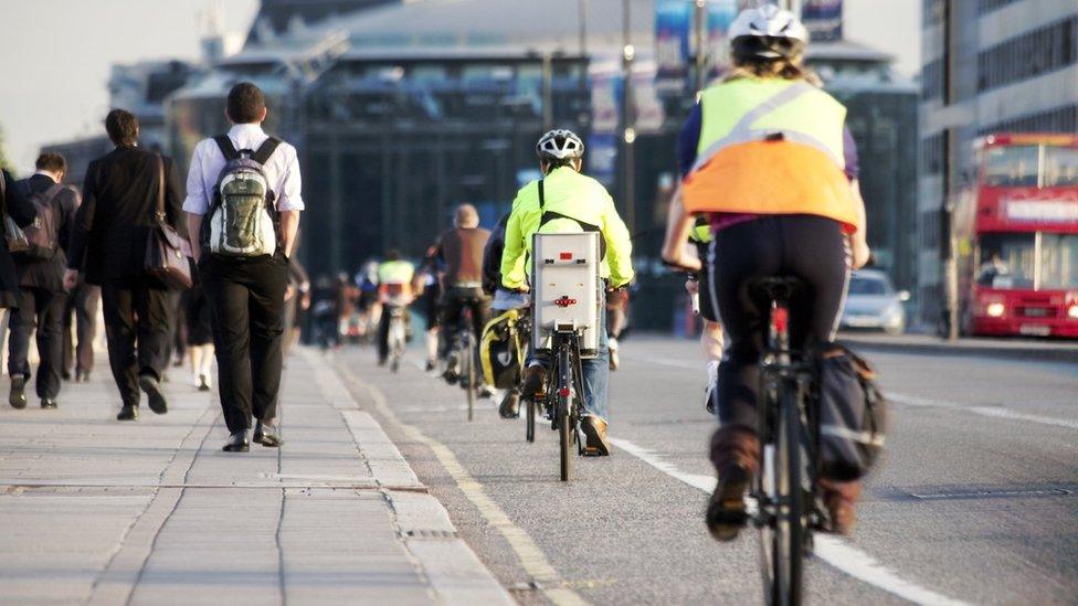 Cyclists riding in cycle lane