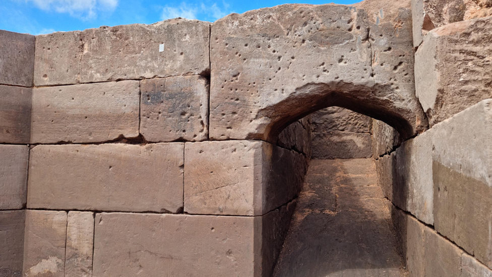 Musket ball marks on gatehouse