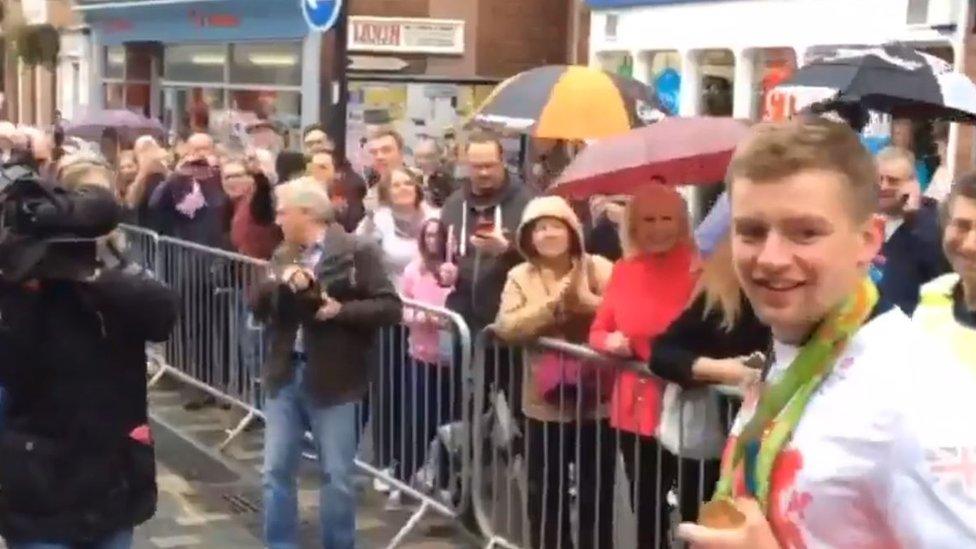 Adam Peaty with crowds