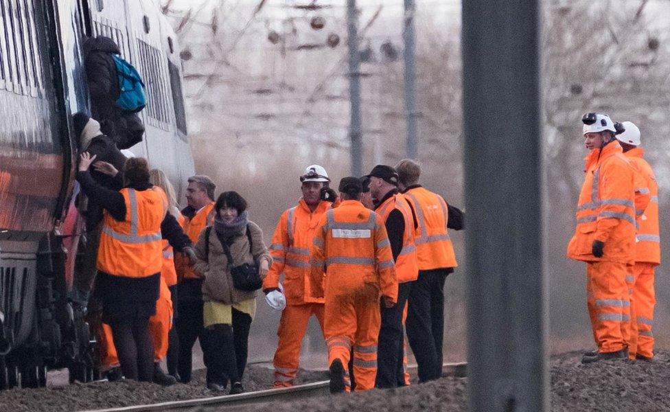 Passengers leave the train