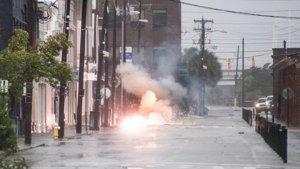 Power lines spark in flood water as Hurricale Dorian hits Charleston, South Caroline, 5 September 2019