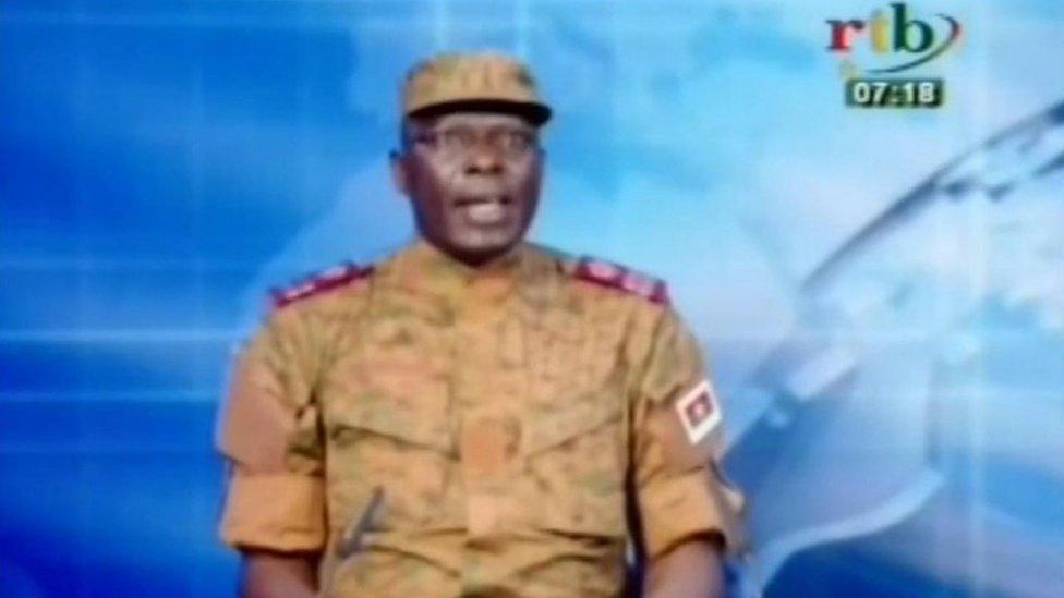 In this frame taken from RTB television, Lieutenant Colonel Mamadou Bamba, Presidential Security Regiment (RSP) spokesperson speaks on national television in Burkina Faso, Thursday 17 September 2015