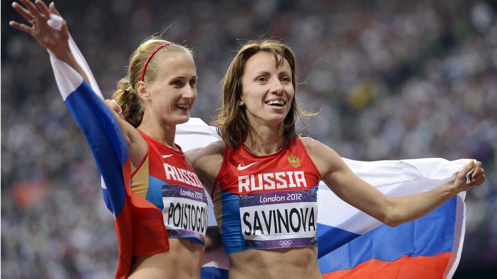 Russian athletes Mariya Savinova (R) and Ekaterina Poistogova came first and third in 800m final at London 2012 Olympics