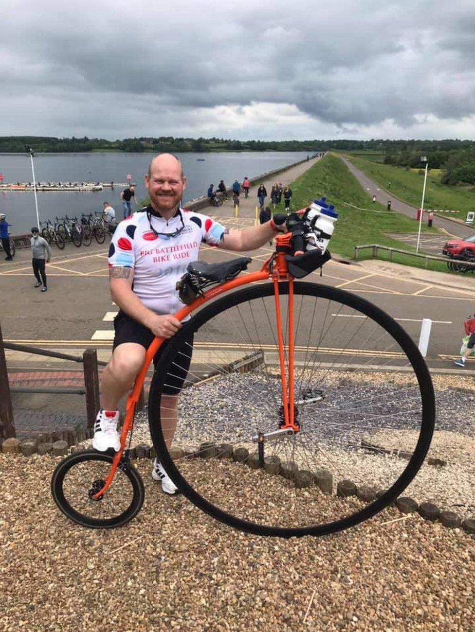 Help for Heroes' fundraising manager Dean Williams with his penny farthing