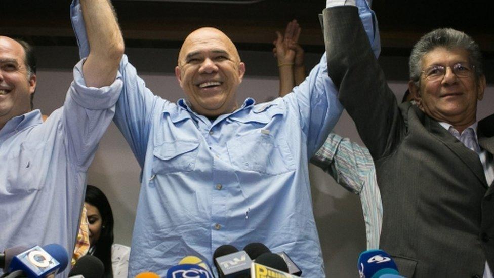 Democratic Unity Roundtable, Venezuelan Opposition coalition, general secretary Jesus Torrealba (C), and deputies Julio Borges (L) and Henry Ramos Allup (R) attend a press conference in Caracas, Venezuela, 29 December 2015.