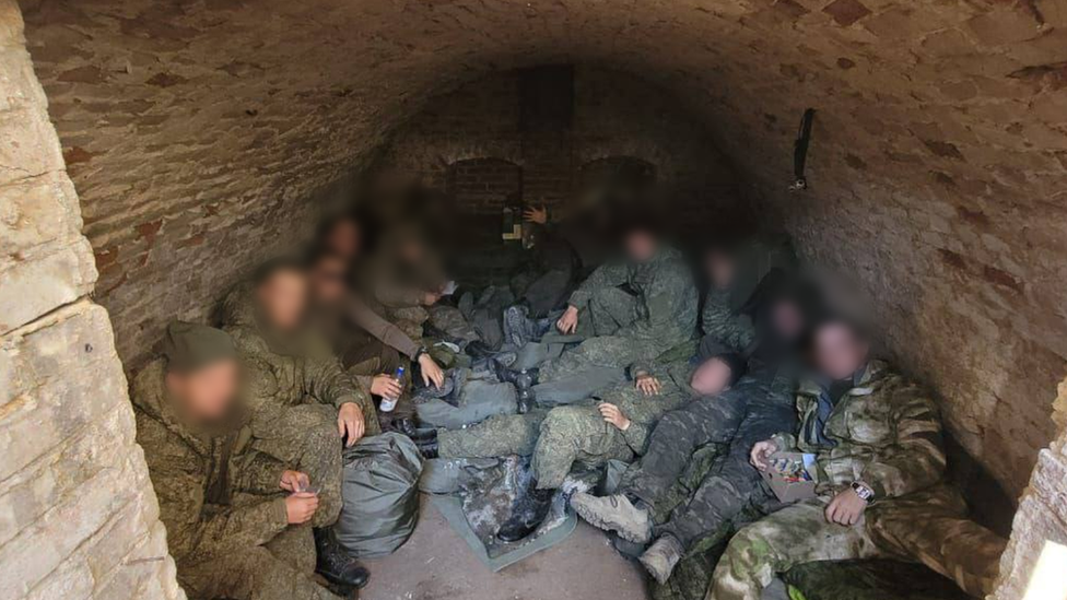 Russian troops in a basement