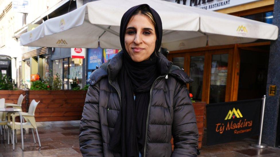 Audiologist Nasrah Asghar on a Cardiff street.