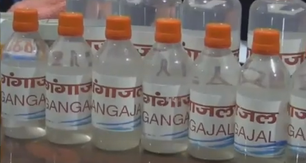 The bottles of Gangajal lined up