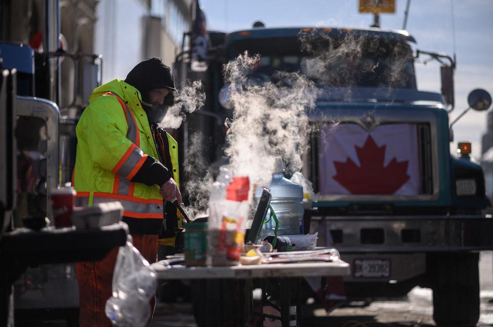 A demonstrator in Ottawa cooks breakfast