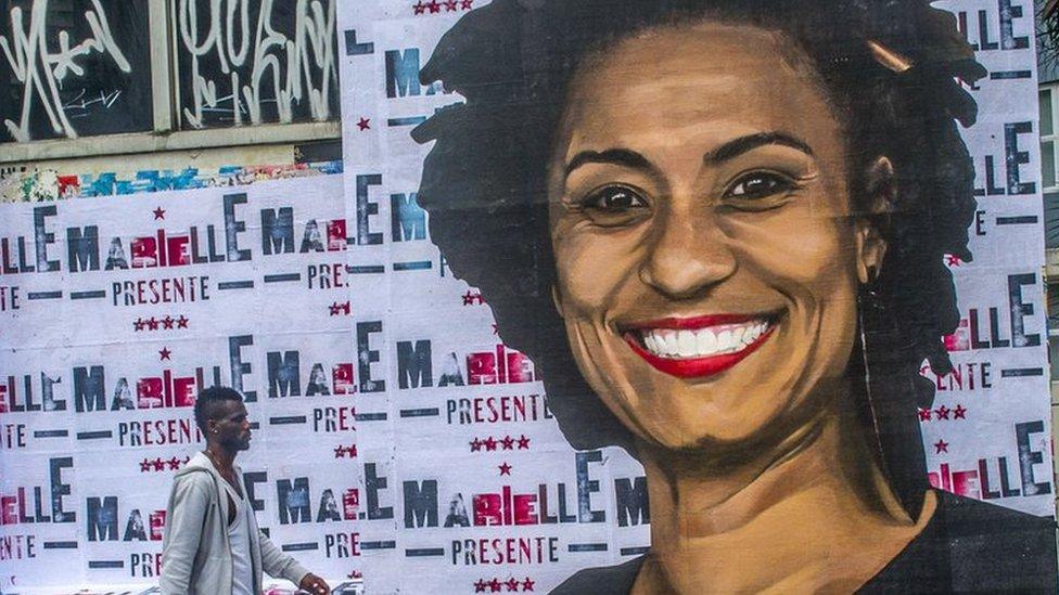 A wheat-paste piece of street art by artist Luis Bueno shows the councilwoman from Rio de Janeiro Marielle Franco.