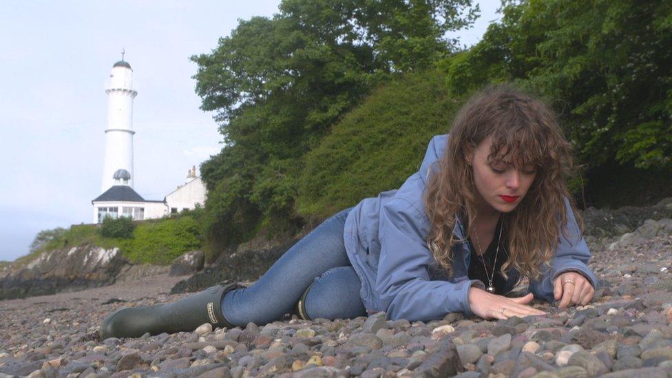 BBC reporter looking for sea glass