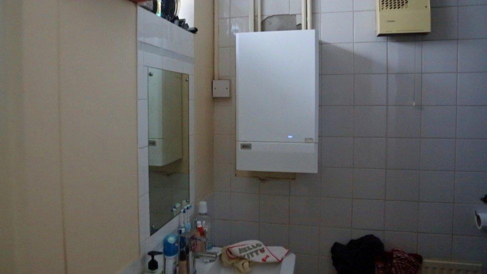 The boiler in the family's bathroom