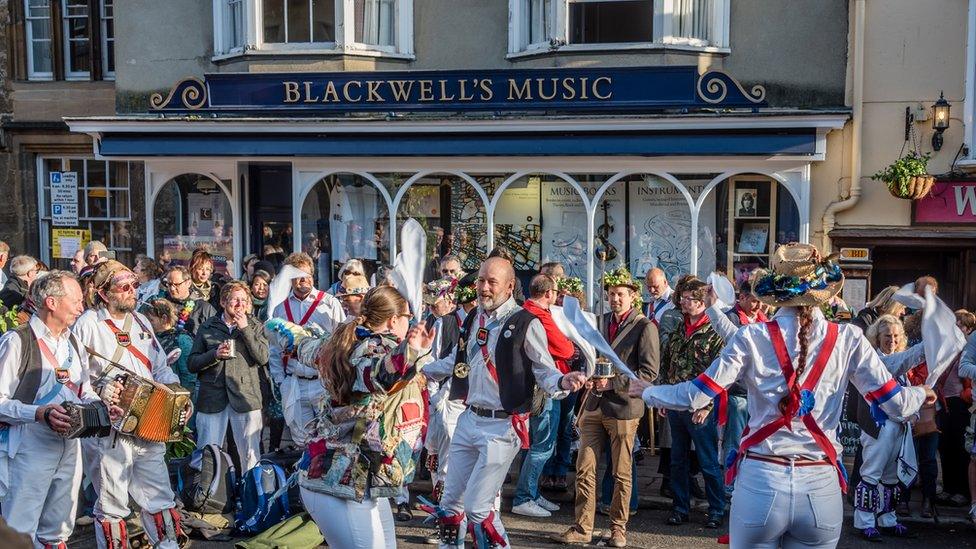 Morris men dancing outside Blackwells bookshop