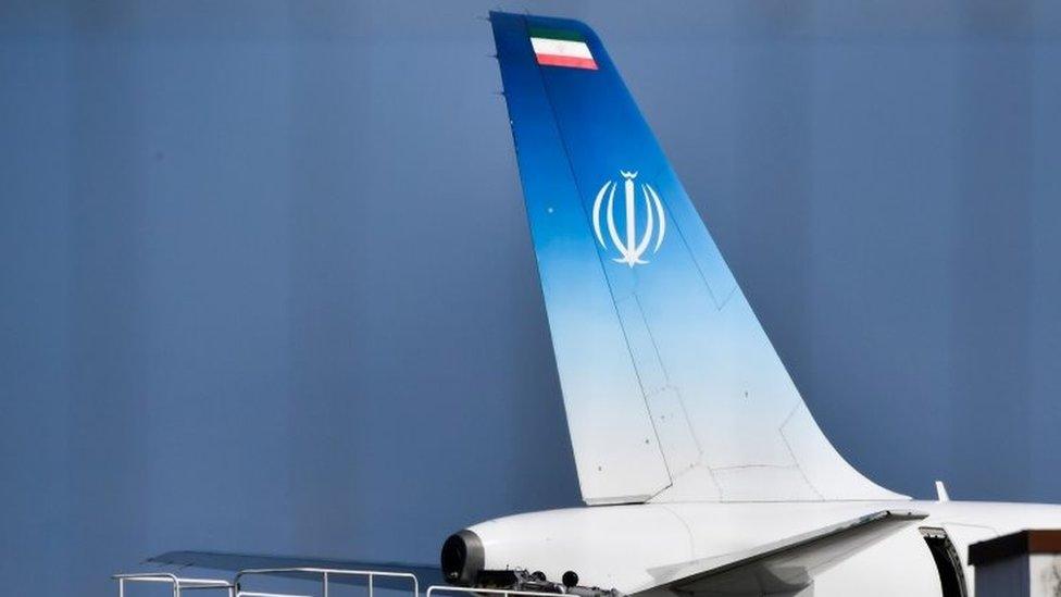 The plane which carried Iran"s Foreign Minister Mohammad Javad Zarif stands on the tarmac at the airport of the French seaside resort of Biarritz,