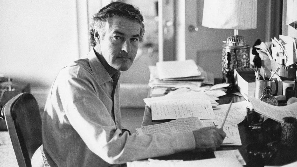 Timothy Leary at his desk