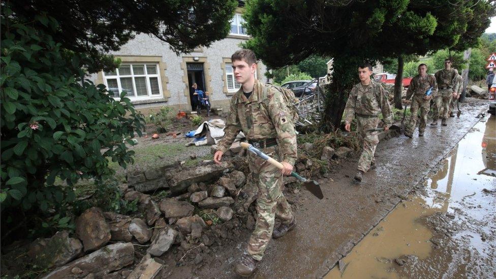 Soldiers help clear up