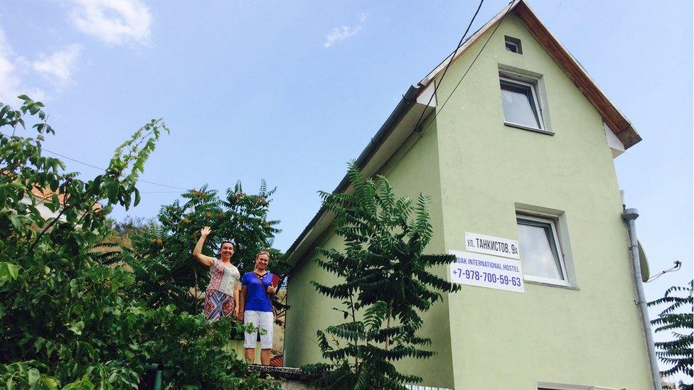 Hostel owner Natalia Kyrychenko (L)