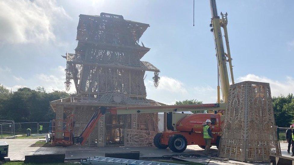 The monument being built