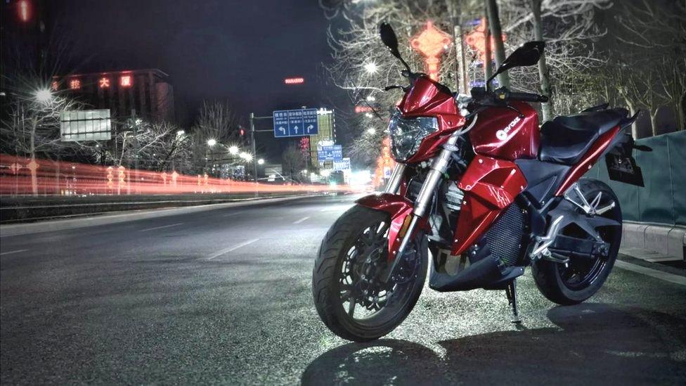 Evoke Urban S motorbike at night