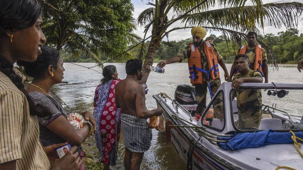 Indian army boat handing out food