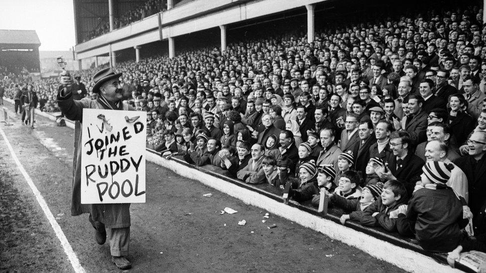 Warren Mitchell, star of TV's Till Death Us Do Part at Upton Park, on 4 February 1968