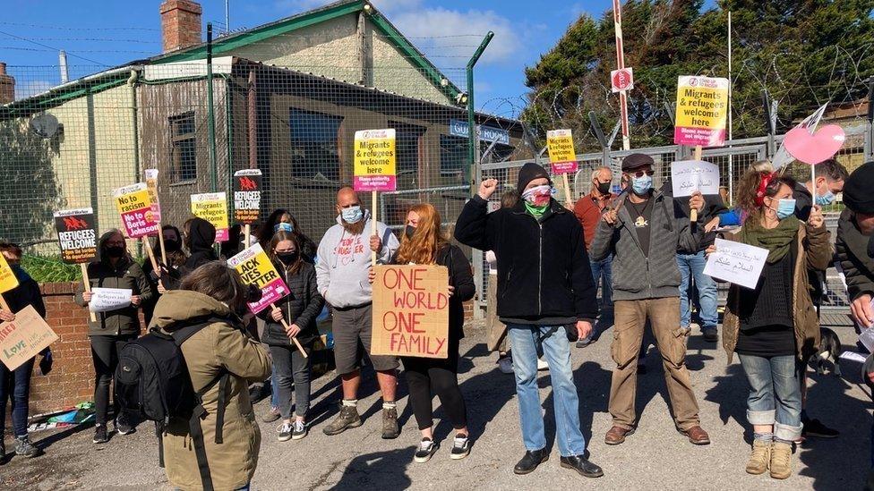 Protesters with banners