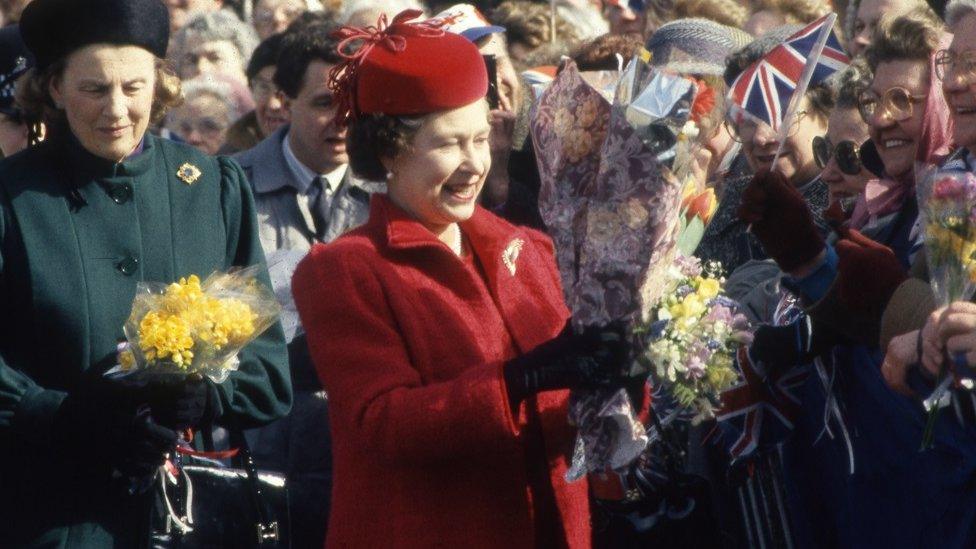 Queen Elizabeth II with crowds at Manchester Exhibition Centre in 1986