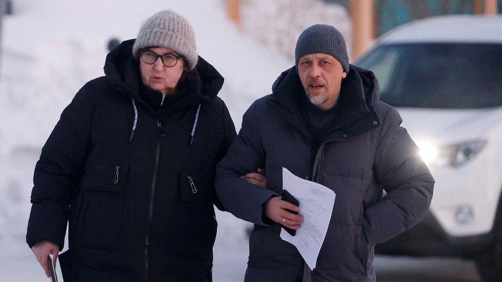 Alexei Navalny's mother Lyudmila and lawyer Vasily Dubkov (right) in a town close to the penal colony where the opposition leader died