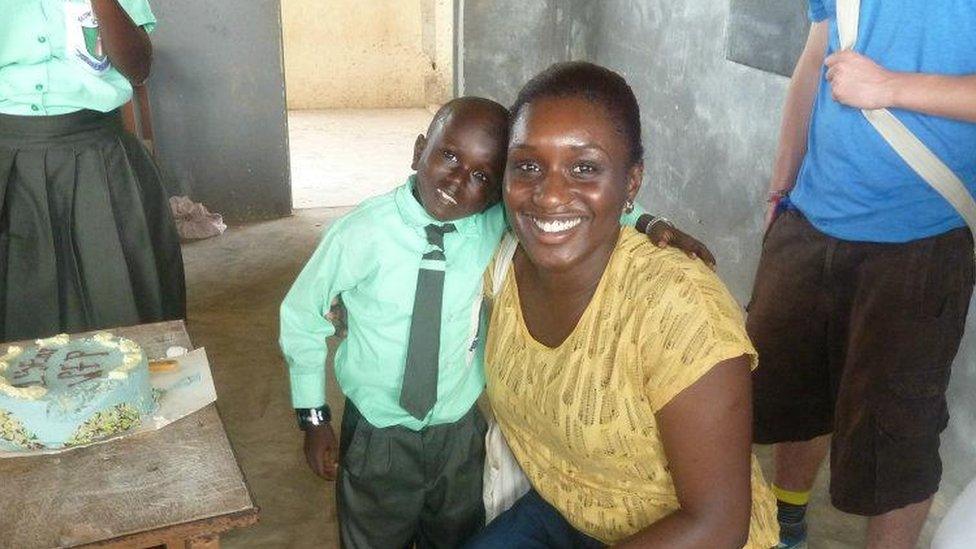 Doyin with a child she taught in the Gambia