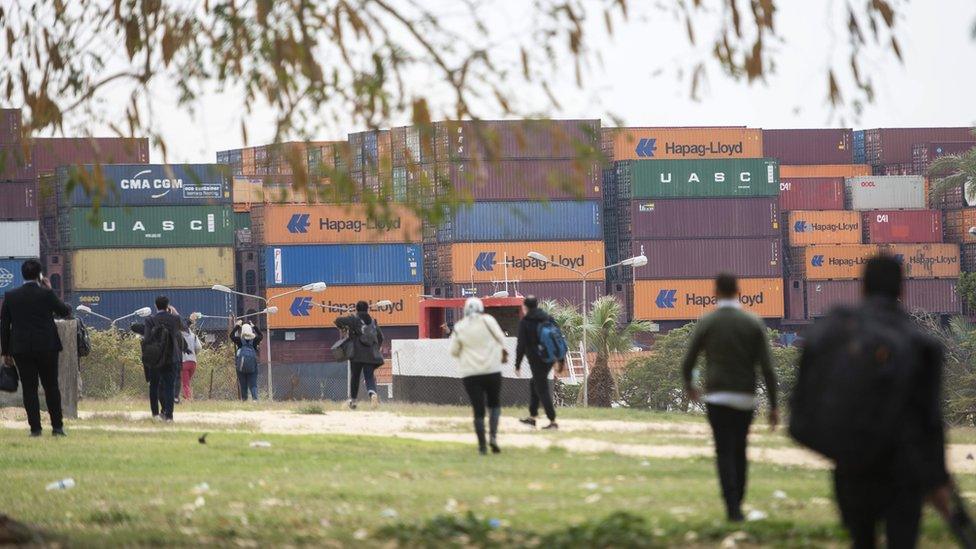 A container ship starts moving in the Suez Canal, in Ismalia, Egypt (30 March 2021)