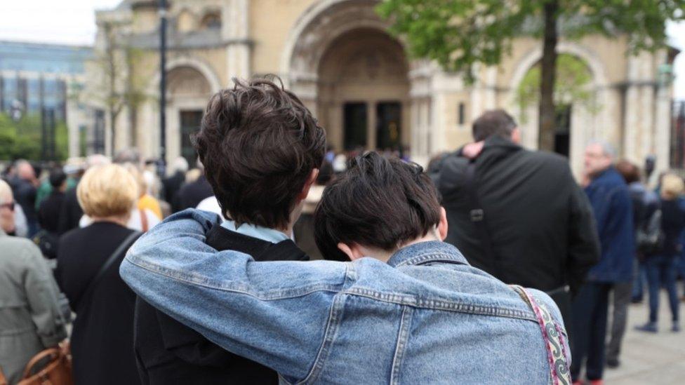 Members of the public outside the funeral service of murdered journalist Lyra McKee, St Anne's Cathedral, Belfast