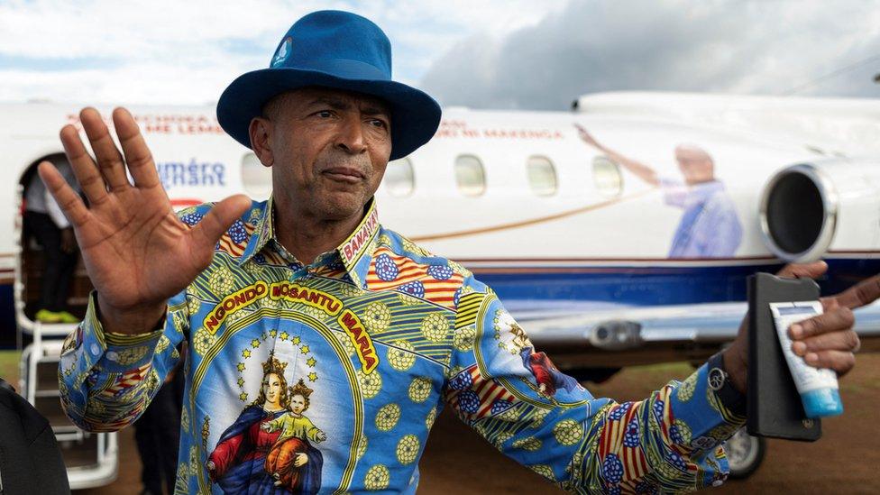 Moïse Katumbi waves to supporters at Beni airport on 26 November, after holding campaign meetings in North Kivu province.