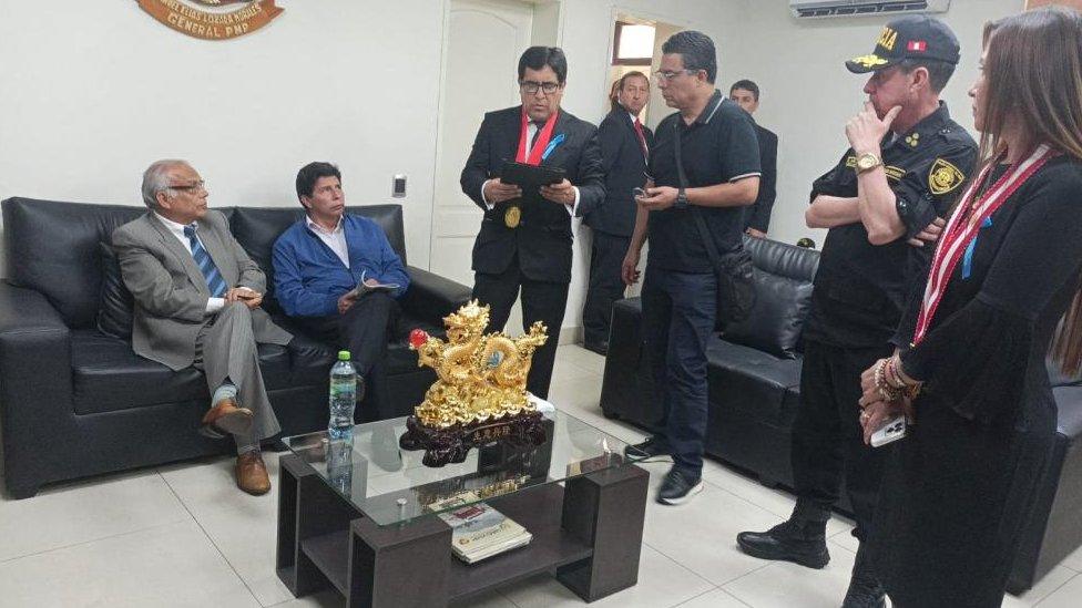 Ousted Peruvian President Pedro Castillo sits next to former Prime Minister Anibal Torres while appearing before anti-corruption prosecutors at the Attorney General's office, following an impeachment trial, in Lima, Peru, December 7, 2022.