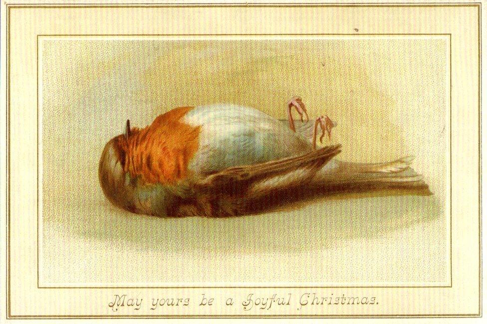 Victorian Christmas card with a dead robin