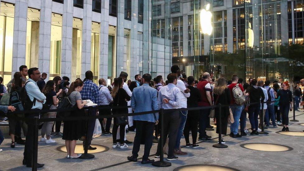 A queue outside Apple's 5th Avenue store in New York, September 2019