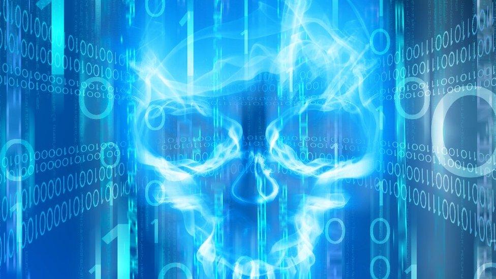 A skull over computer code