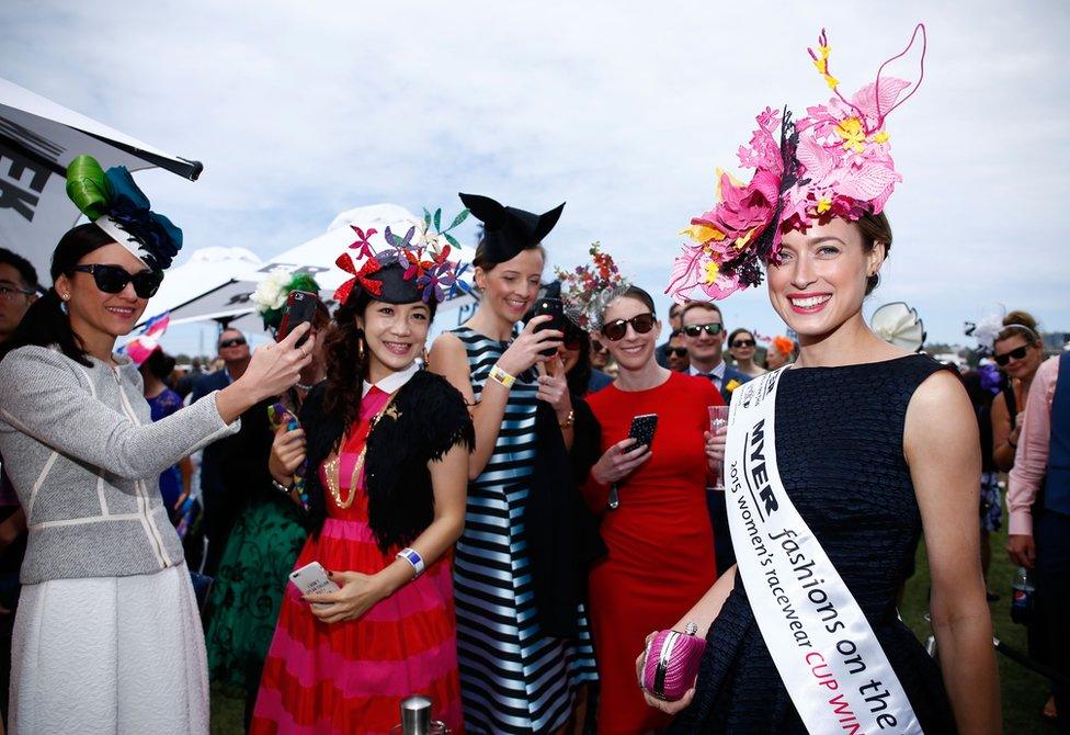 Myer Fashions on the Field Women's Racewear winner Emily Hunter poses on Melbourne Cup Day at Flemington Racecourse on November 3, 2015