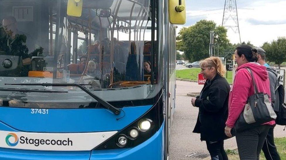 People getting on a Stagecoach bus