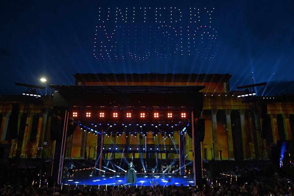 Drone display quotes "United by Music" during the National Lottery's Big Eurovision Welcome event outside St George's Hall on May 07, 2023 in Liverpool