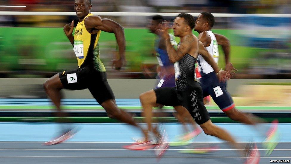 Bolt posing in semi final race.