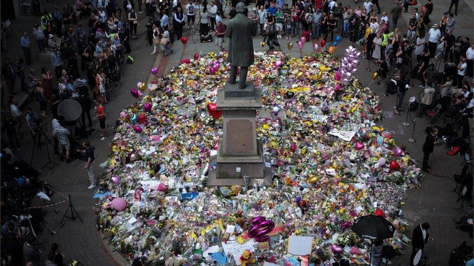 Floral tributes to the victims in St Ann's Square, Manchester